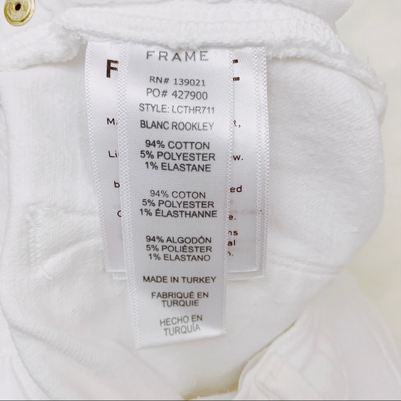 FRAME Distressed White Denim Shorts - Picture 10 of 10